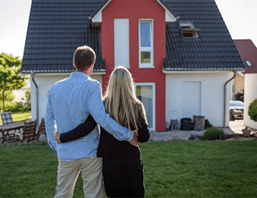 Couple looking at a house